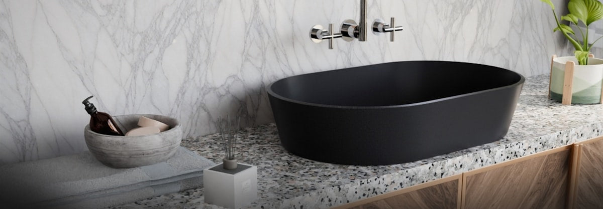 Modern black basin with marble surround